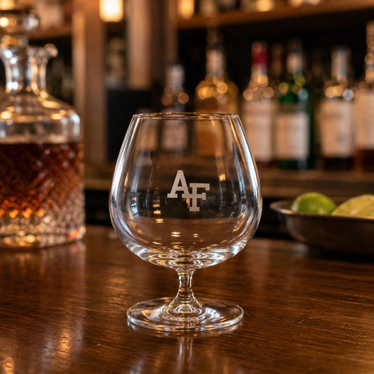 Set of two 24 oz clear brandy glasses with precision-etched AF logos displayed with a premium black gift box.