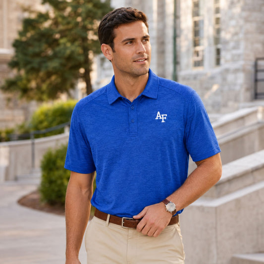Men’s royal blue Air Force Academy performance polo with moisture-wicking fabric and embroidered AF logo on chest