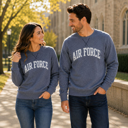 Heather navy Air Force Weathered Fleece Crew sweatshirt featuring a vintage-inspired wash, arched Air Force graphic, V-stitched neckline, and brushed fleece interior.