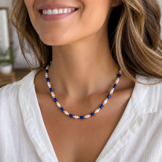 Cadet Pearl Beaded Necklace with alternating royal blue beads, pearl accents, white beads, and a gold-tone adjustable extender chain.