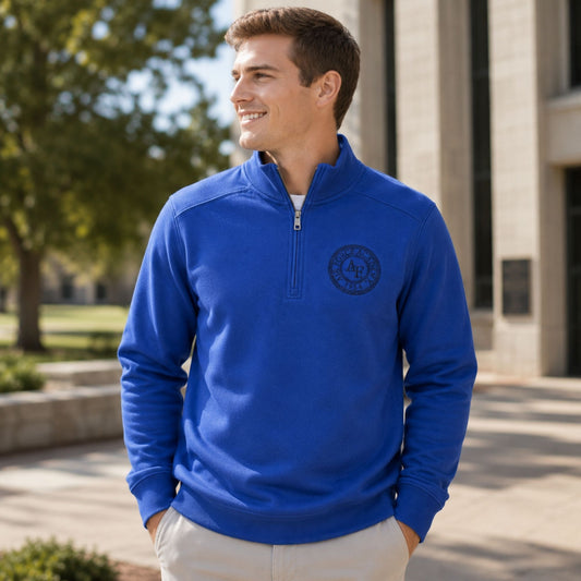 Royal blue Legacy Seal Quarter Zip featuring a tonal embroidered Air Force Academy seal on the left chest.