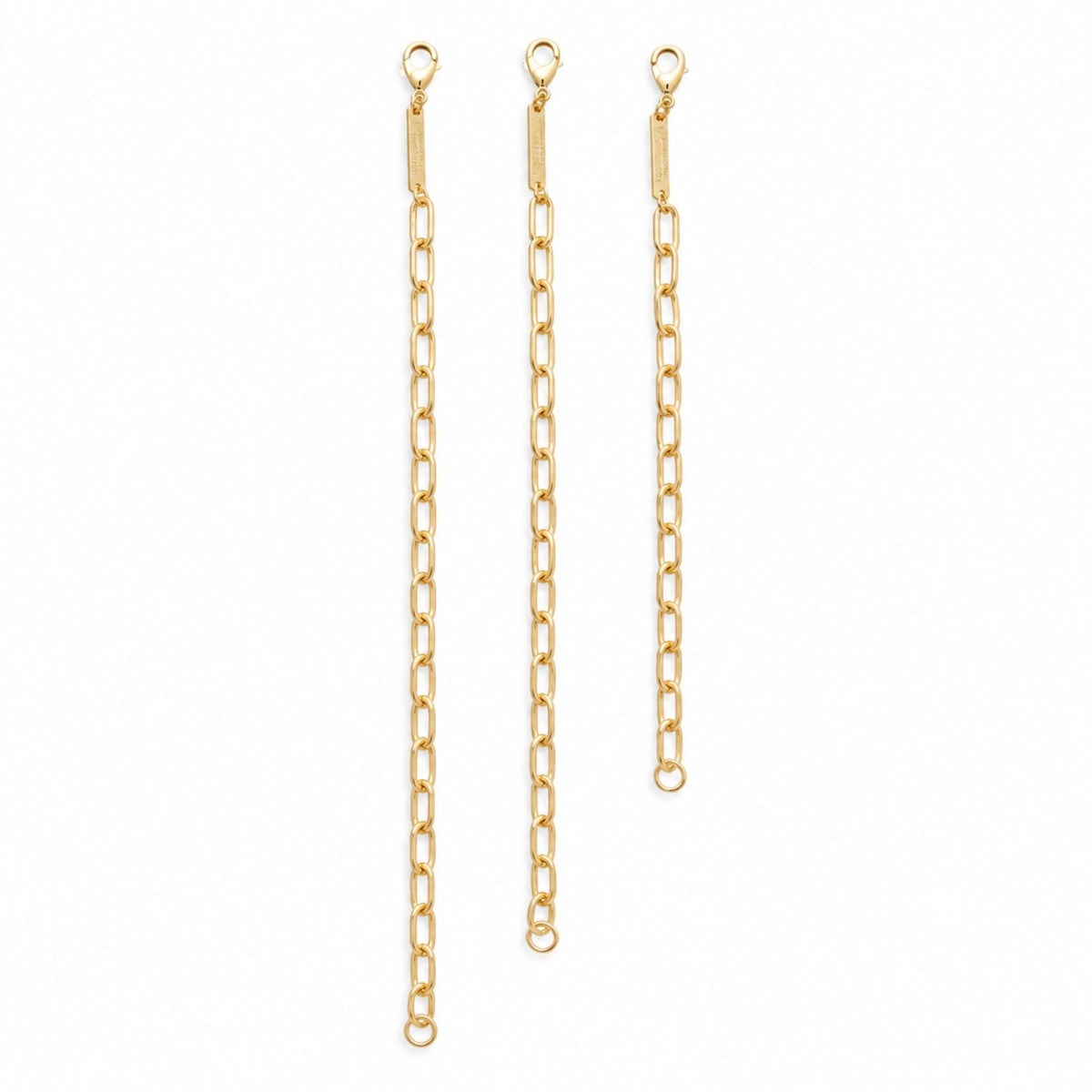 Three sizes of the My Cadet Charm Bracelet – Anna featuring polished gold-tone paperclip links and lobster clasps.