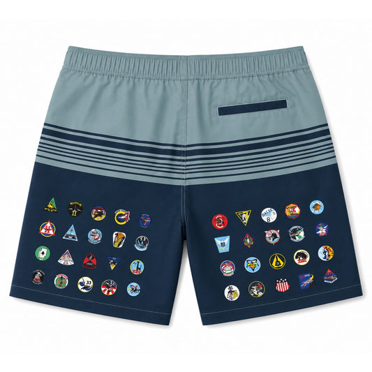 40 Squadron One Family swim trunks in Pantone 5405C and 7546C featuring custom squadron insignia graphics, mesh liner, two front pockets, and rear pocket.