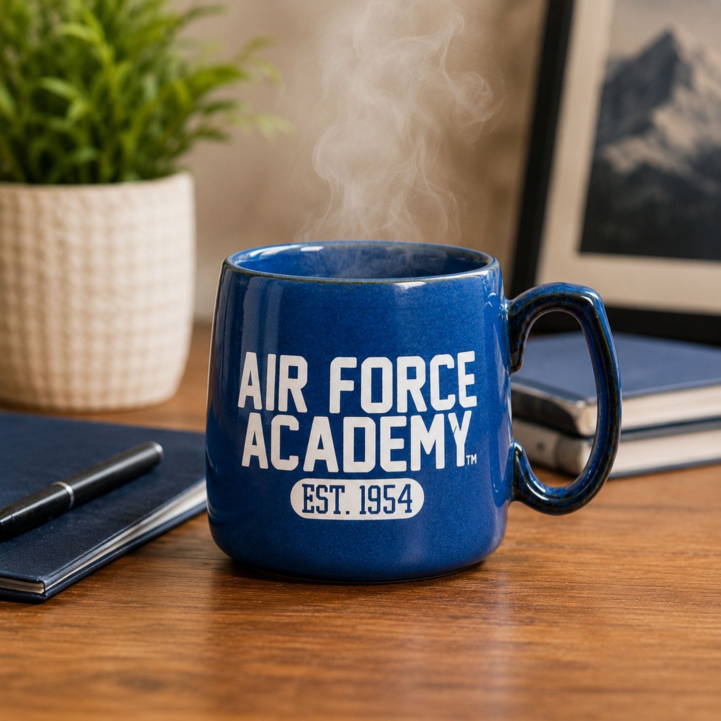 blue ceramic mug with white "Air Force Academy" text 