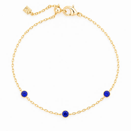 Academy Gemstone Bracelet with three royal-blue glass stones set along a delicate 18K gold-plated chain.