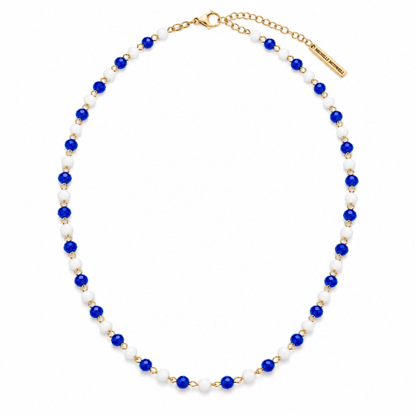Academy Blue Small Beaded Necklace with alternating royal blue and white faceted beads and soft gold-tone accents.
