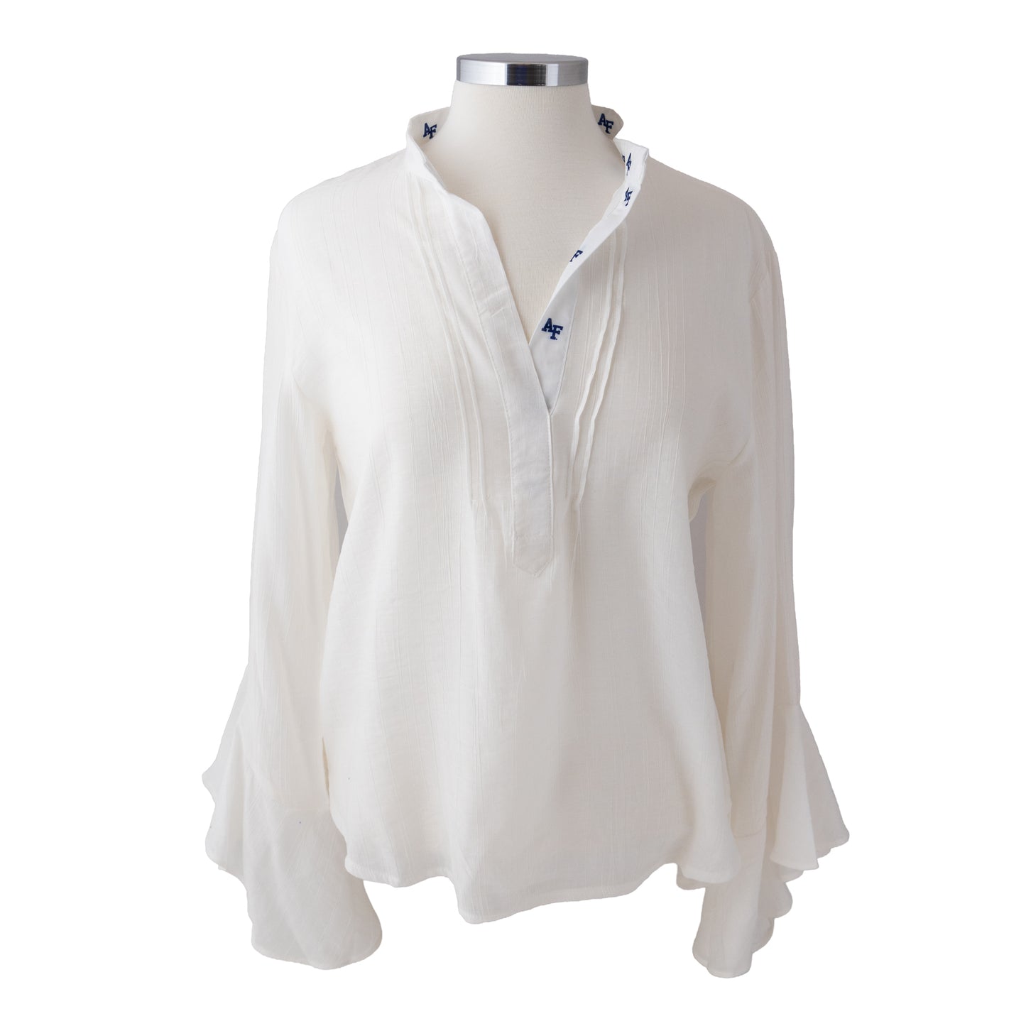 Cream women’s Air Force Academy ruffle tunic with long sleeves and AF logo trim on the neckline