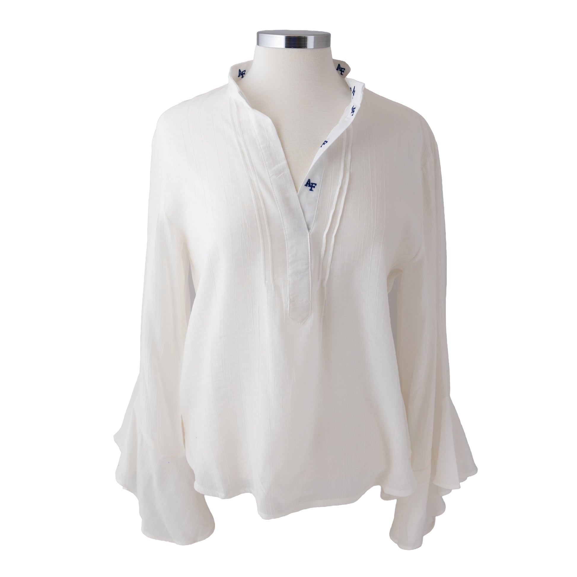 Cream women’s Air Force Academy ruffle tunic with long sleeves and AF logo trim on the neckline