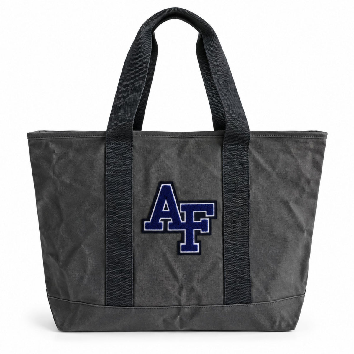 Front view of the charcoal Air Force Canvas Boat Tote featuring a blue and white chenille AF logo, sturdy black handles, and structured canvas design.