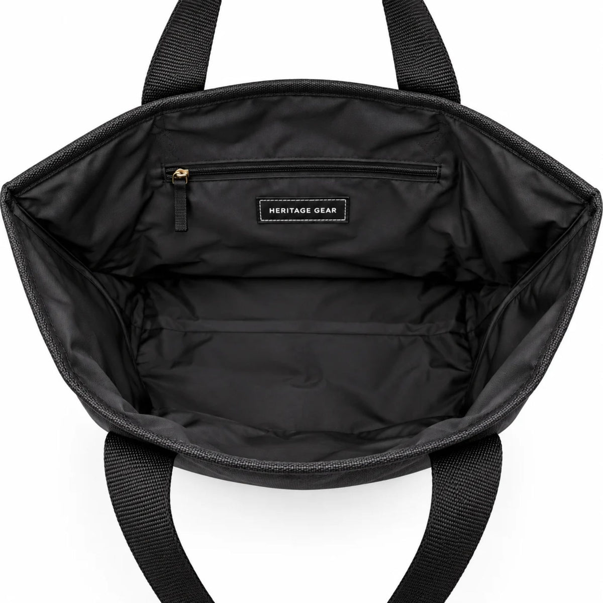 Interior of the Air Force Canvas Boat Tote showing spacious black lining, secure zippered pocket, and Heritage Gear label.