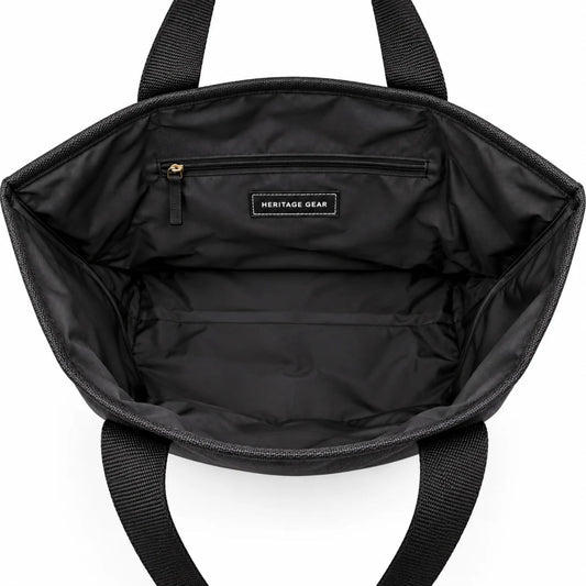 Interior of the Air Force Canvas Boat Tote showing spacious black lining, secure zippered pocket, and Heritage Gear label.