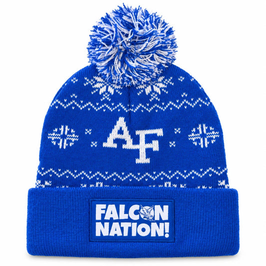 Front of royal blue Air Force beanie with white snowflake pattern, blue and white pom pom, and Falcon Nation cuff patch.