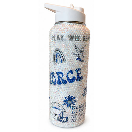Reverse view of an iridescent rhinestone water bottle featuring blue Air Force lettering, a rainbow and decorative graphics.