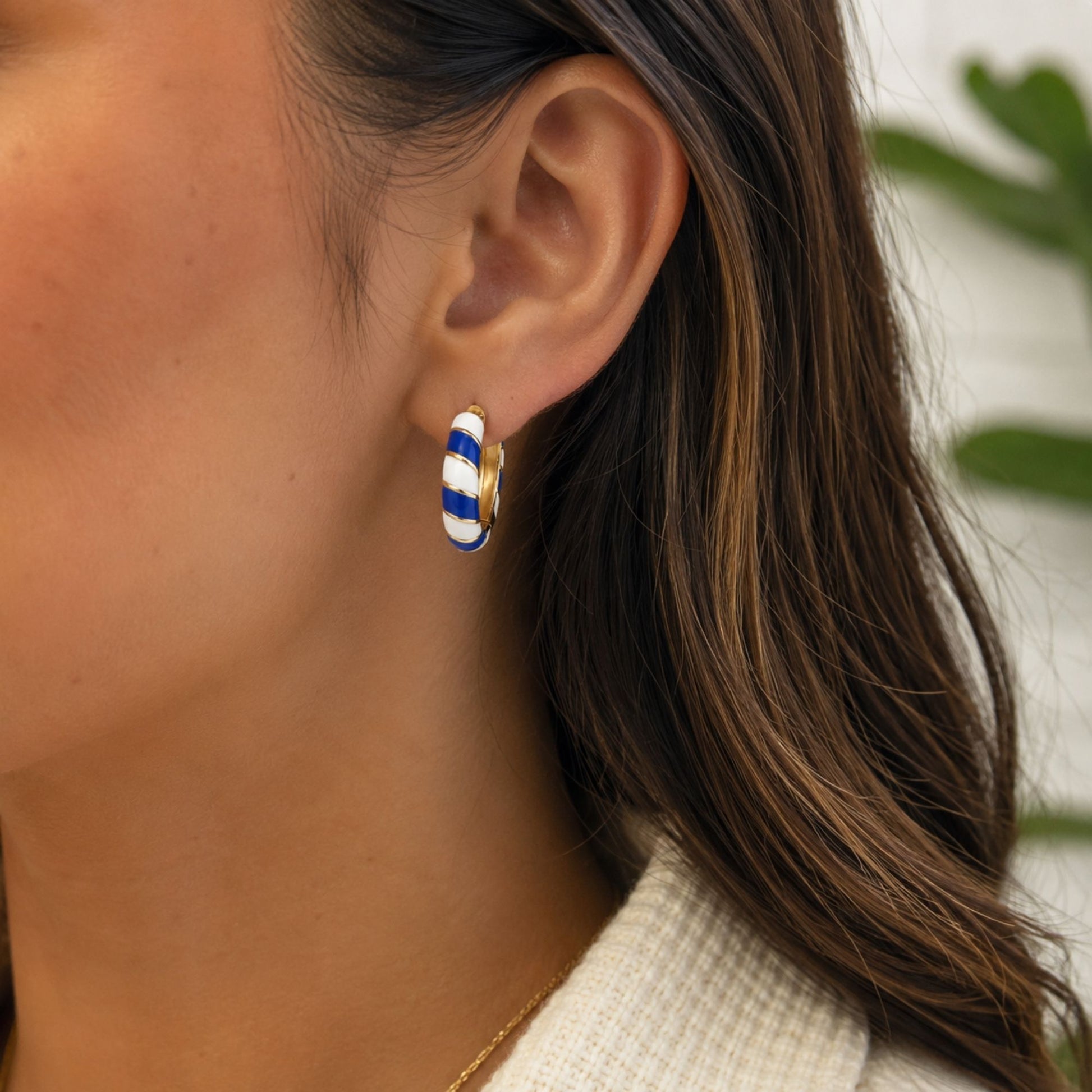 Gold-tone hoop earrings with alternating cadet blue and white enamel stripes