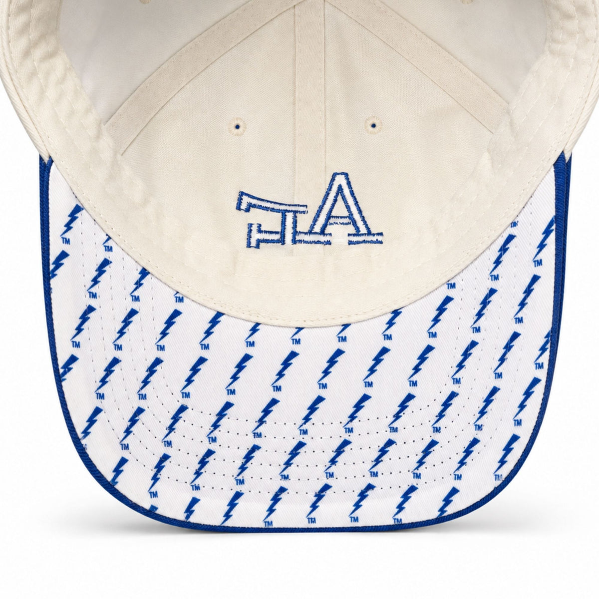 Underbill of the FALCONS Sideshow Hat featuring a repeating blue lightning bolt pattern and AF logo
