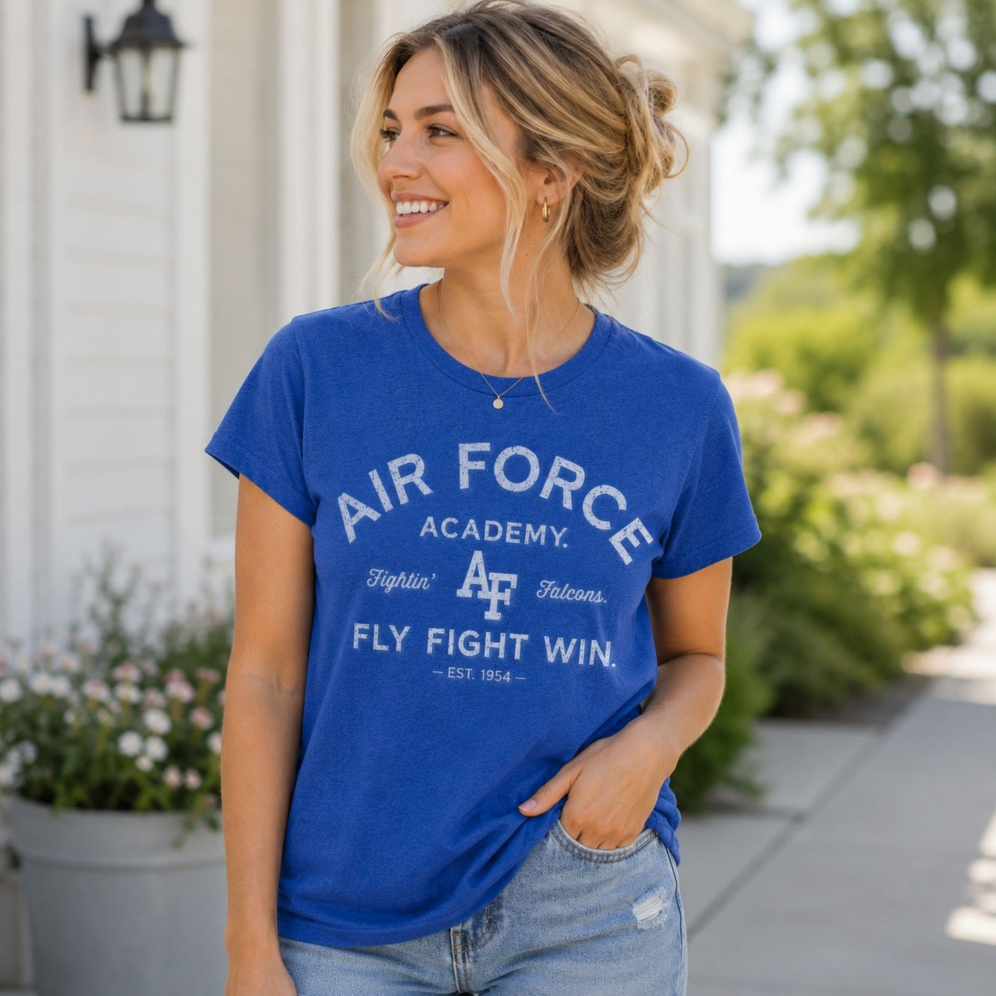 Women's royal blue Air Force Academy Fly Fight Win tee featuring a distressed tonal vintage collegiate graphic on the front.