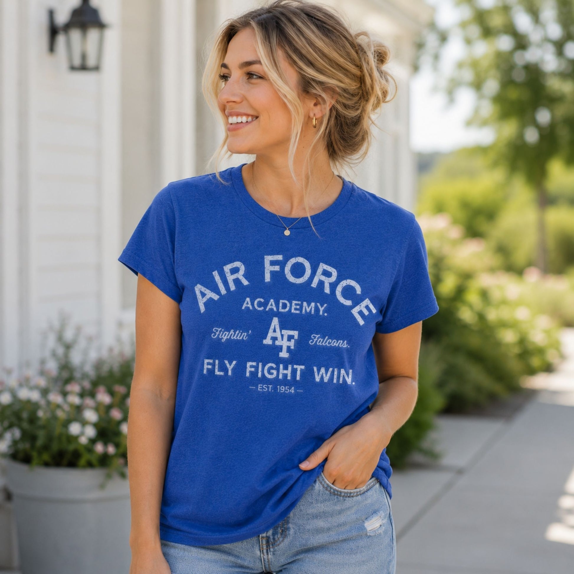 Women's royal blue Air Force Academy Fly Fight Win tee featuring a distressed tonal vintage collegiate graphic on the front.