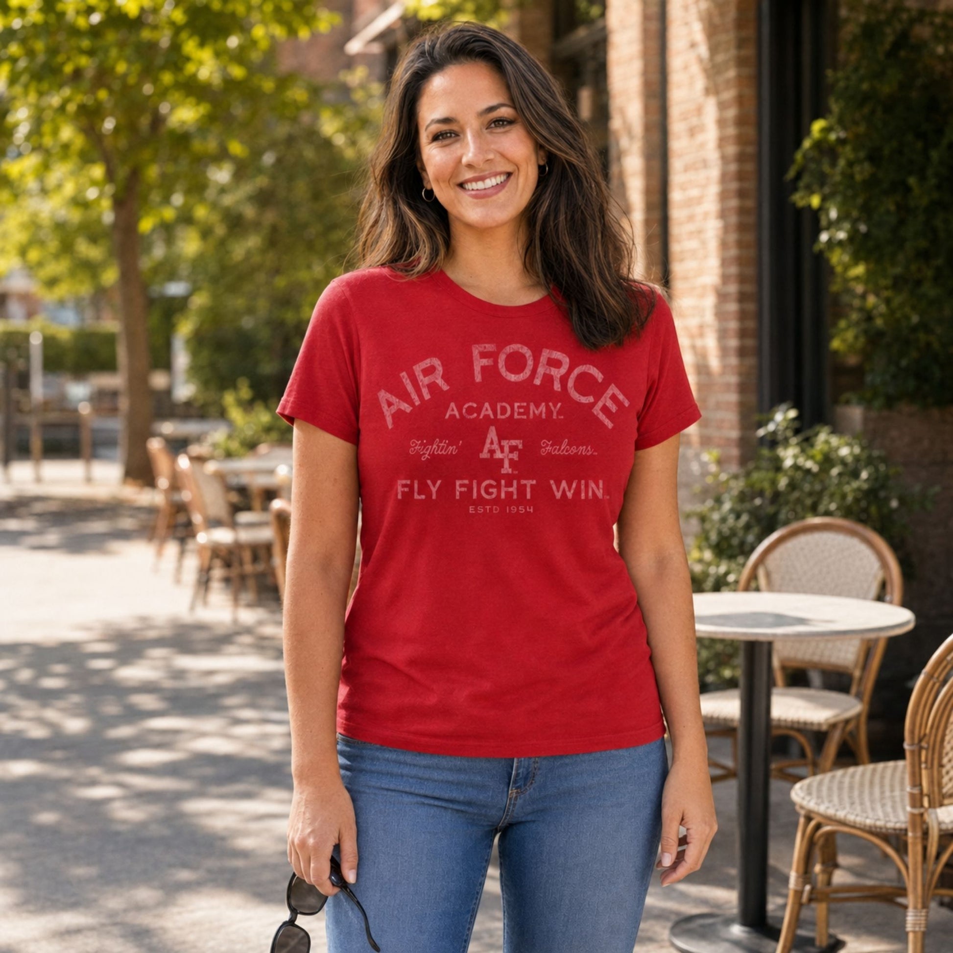 Women's red Air Force Academy Fly Fight Win tee featuring a distressed vintage collegiate graphic on the front.