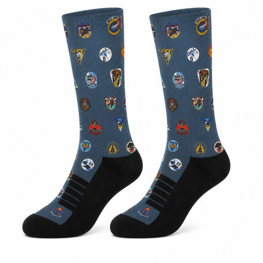 Forty Squadrons. One Family. crew socks featuring an all-over USAFA squadron patch design on a steel blue knit with black heel and toe.