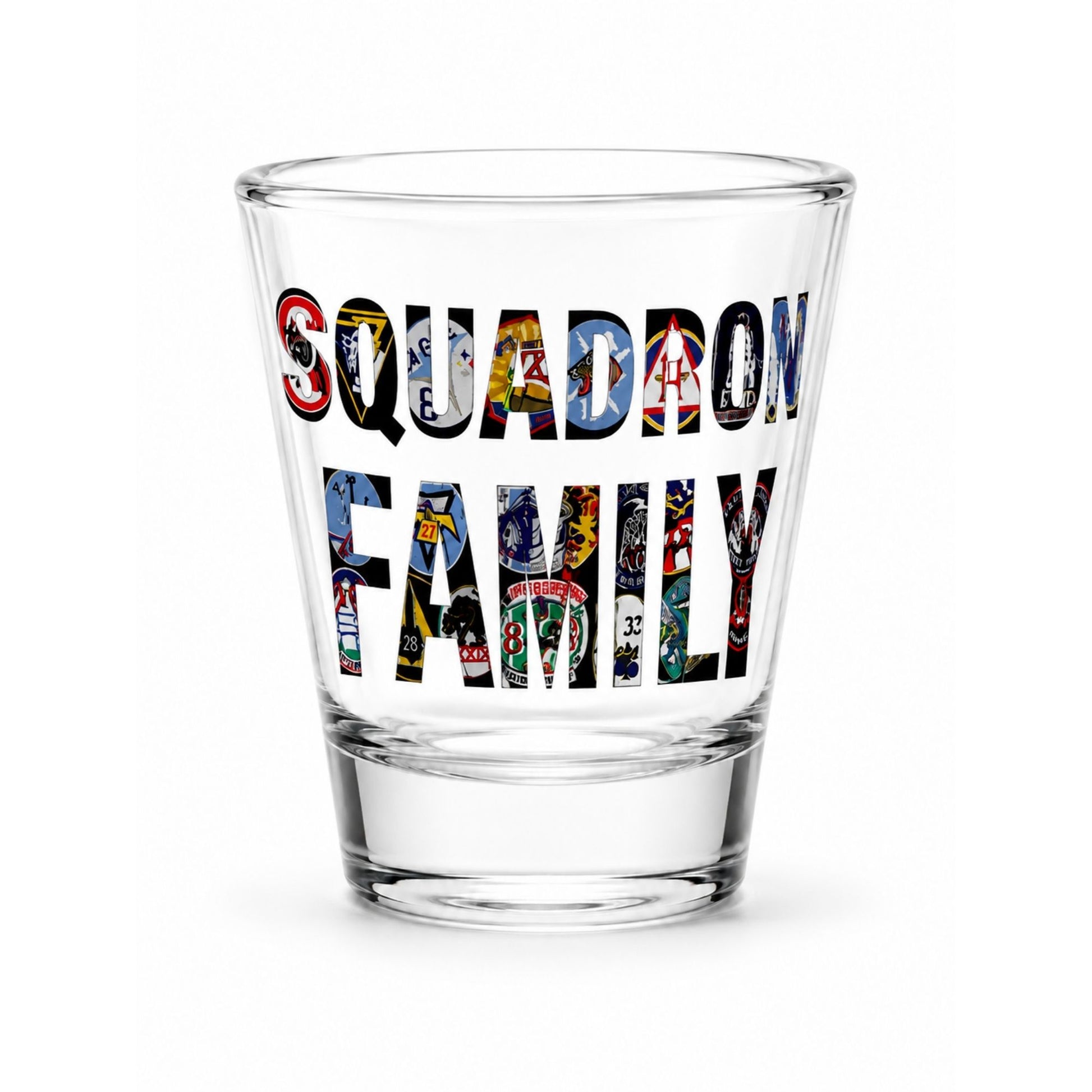 Clear glass shot glass featuring the phrase "Forty Squadrons. One Family." with artwork representing all 40 United States Air Force Academy cadet squadrons.