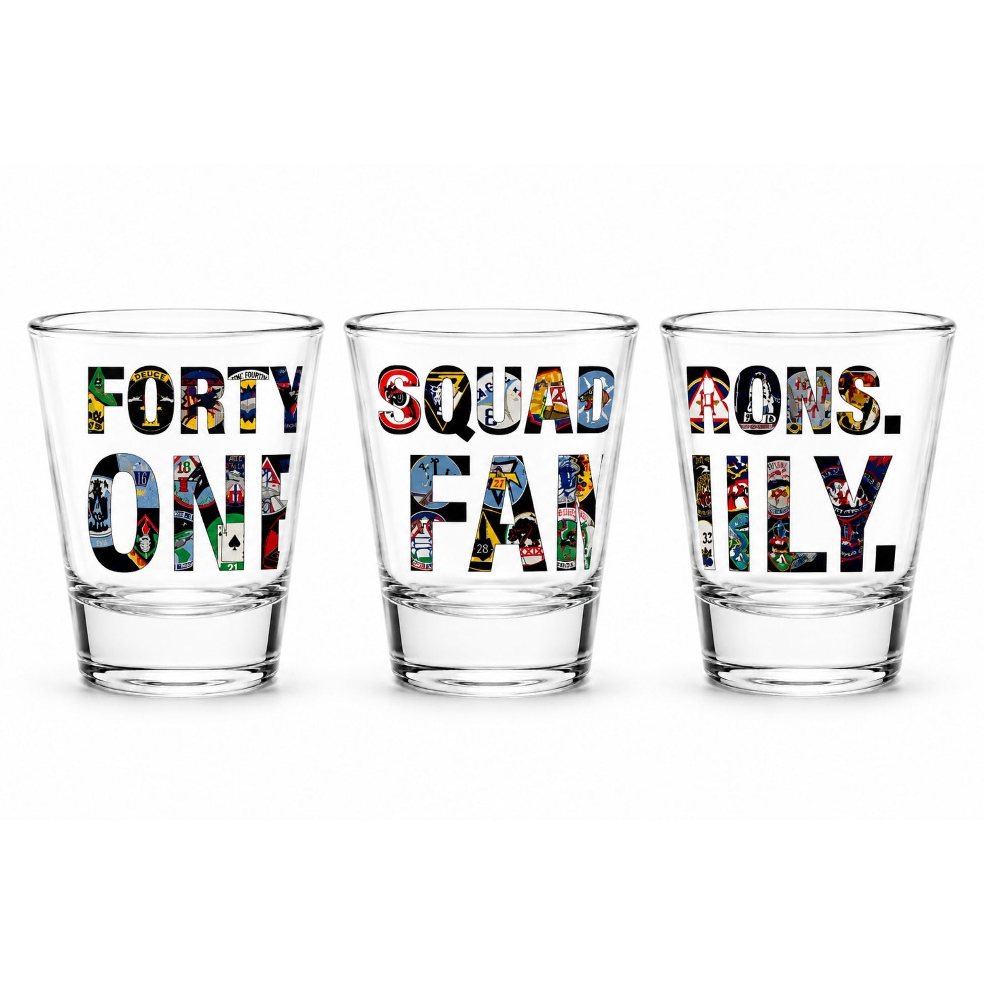 Clear glass shot glass featuring the phrase "Forty Squadrons. One Family." with artwork representing all 40 United States Air Force Academy cadet squadrons.