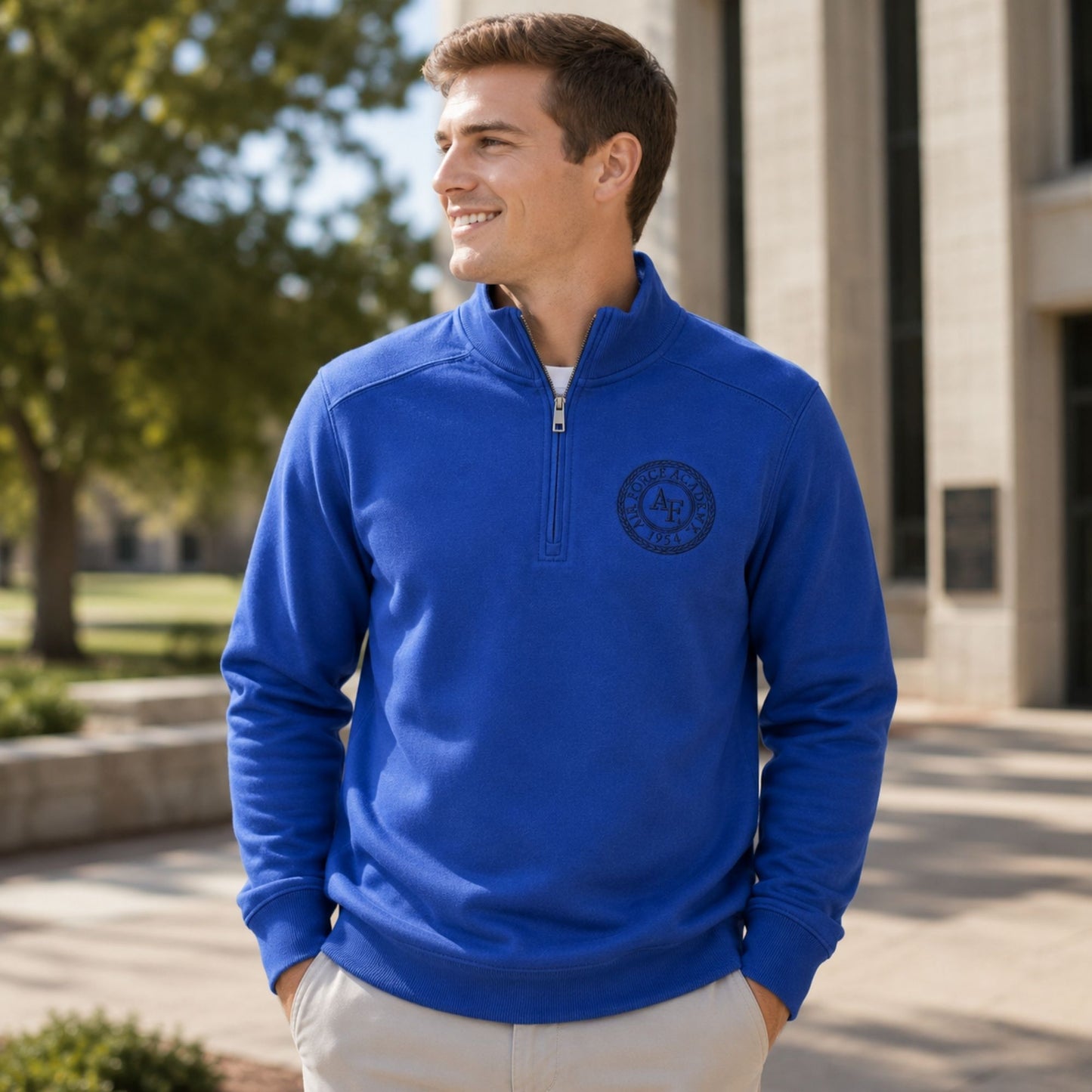 Royal blue Legacy Seal Quarter Zip featuring a tonal embroidered Air Force Academy seal on the left chest.