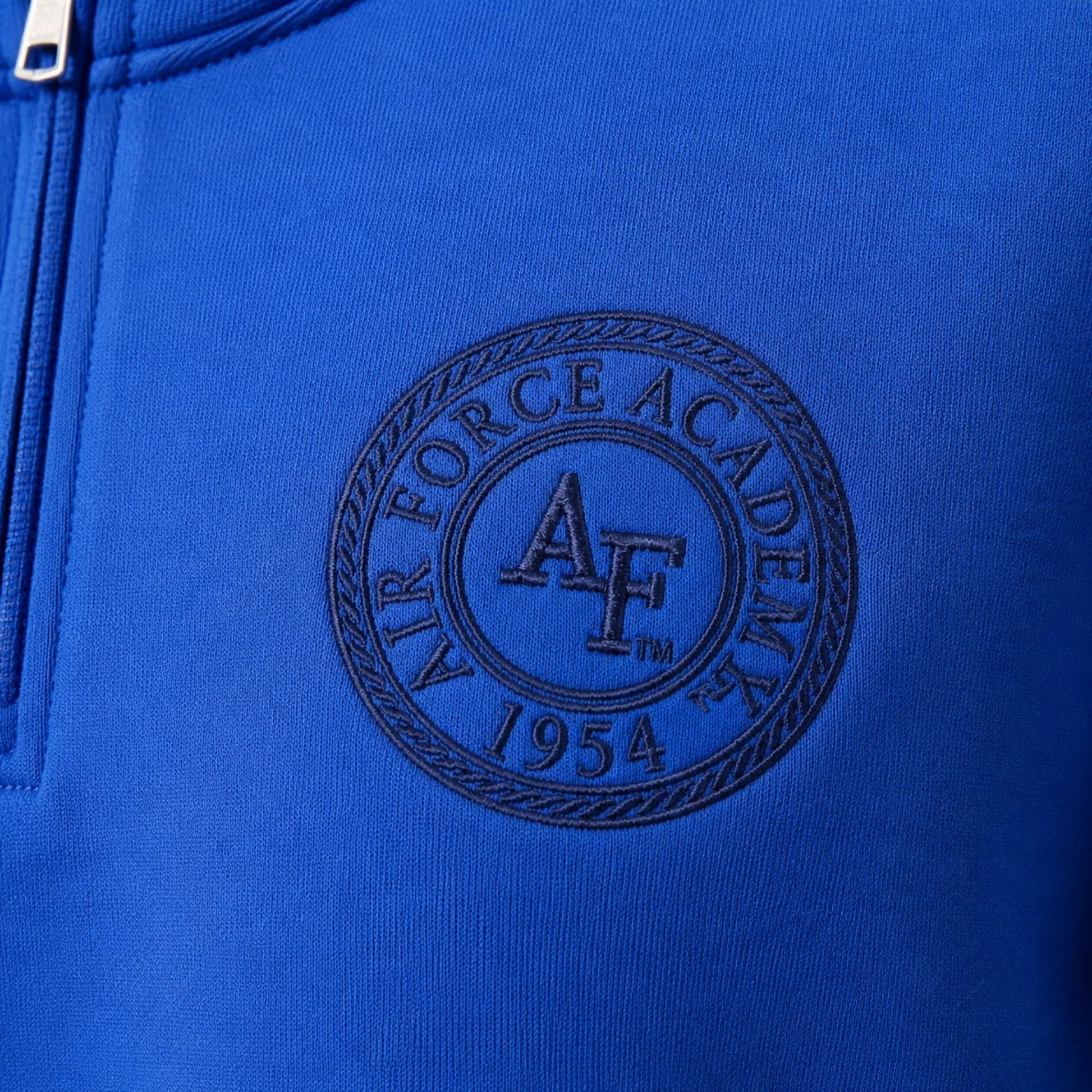 Royal blue Legacy Seal Quarter Zip featuring a tonal embroidered Air Force Academy seal on the left chest.