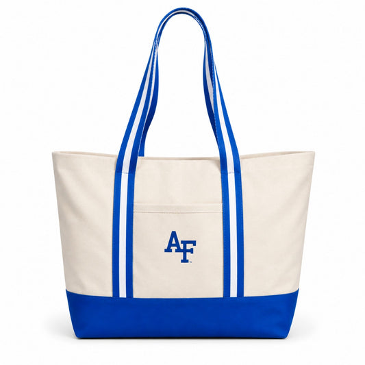 Long Blue Line canvas tote bag with blue base, striped handles, and Air Force Academy AF logo on a white background