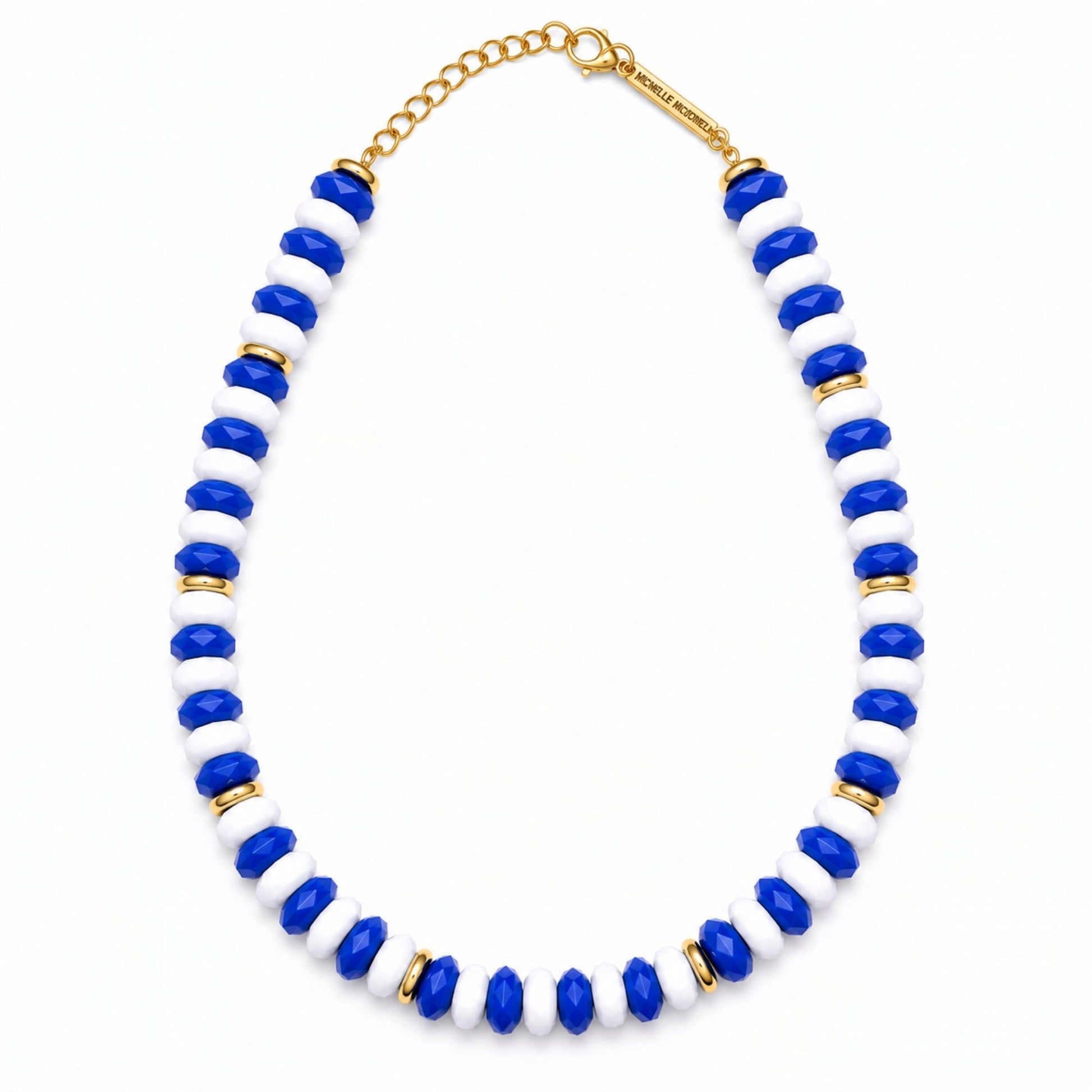 Long Blue Line chunky beaded necklace featuring alternating royal blue and white faceted beads with gold-tone accents.