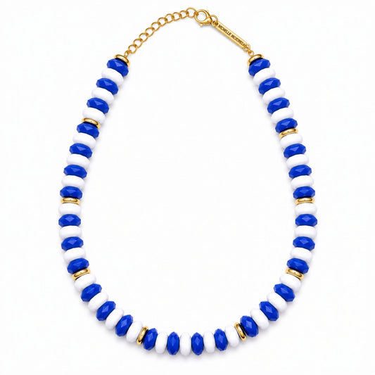 Long Blue Line chunky beaded necklace featuring alternating royal blue and white faceted beads with gold-tone accents.