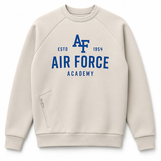 Men's Air Force Academy crewneck sweatshirt in soft beige scuba knit fabric featuring blue Academy graphics, raglan sleeves, and a hidden side zip pocket.