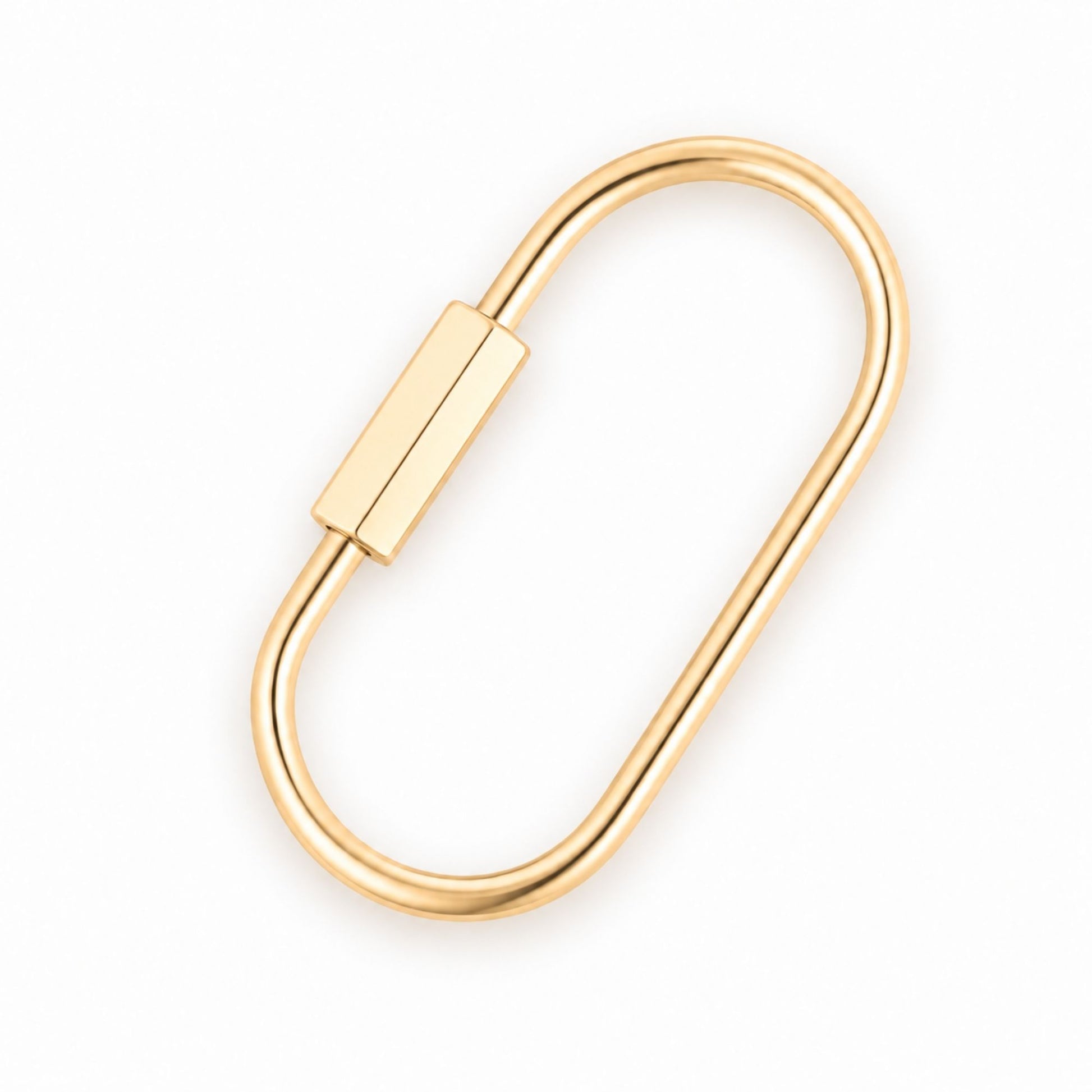 Polished gold-tone purse charm carabiner with screw-lock clasp on a white background.