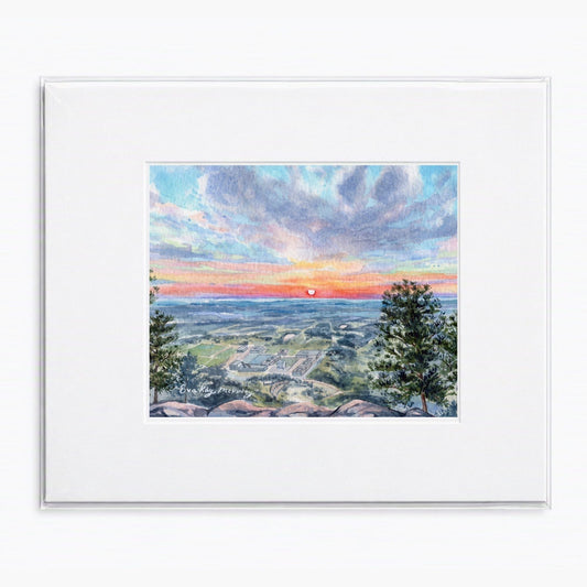 Matted Sunrise on Eagle’s Peak watercolor print featuring a colorful sunrise over the U.S. Air Force Academy.