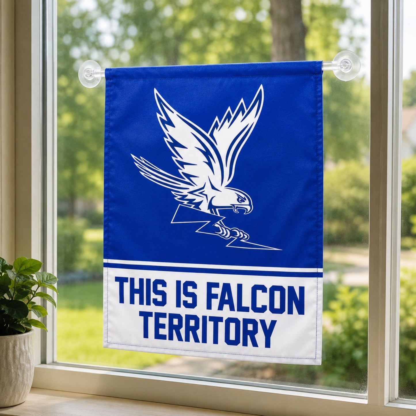 This Is Falcon Territory Garden & Window Flag featuring the iconic Air Force Academy falcon graphic in royal blue and white, displayed on a black garden flag stand.