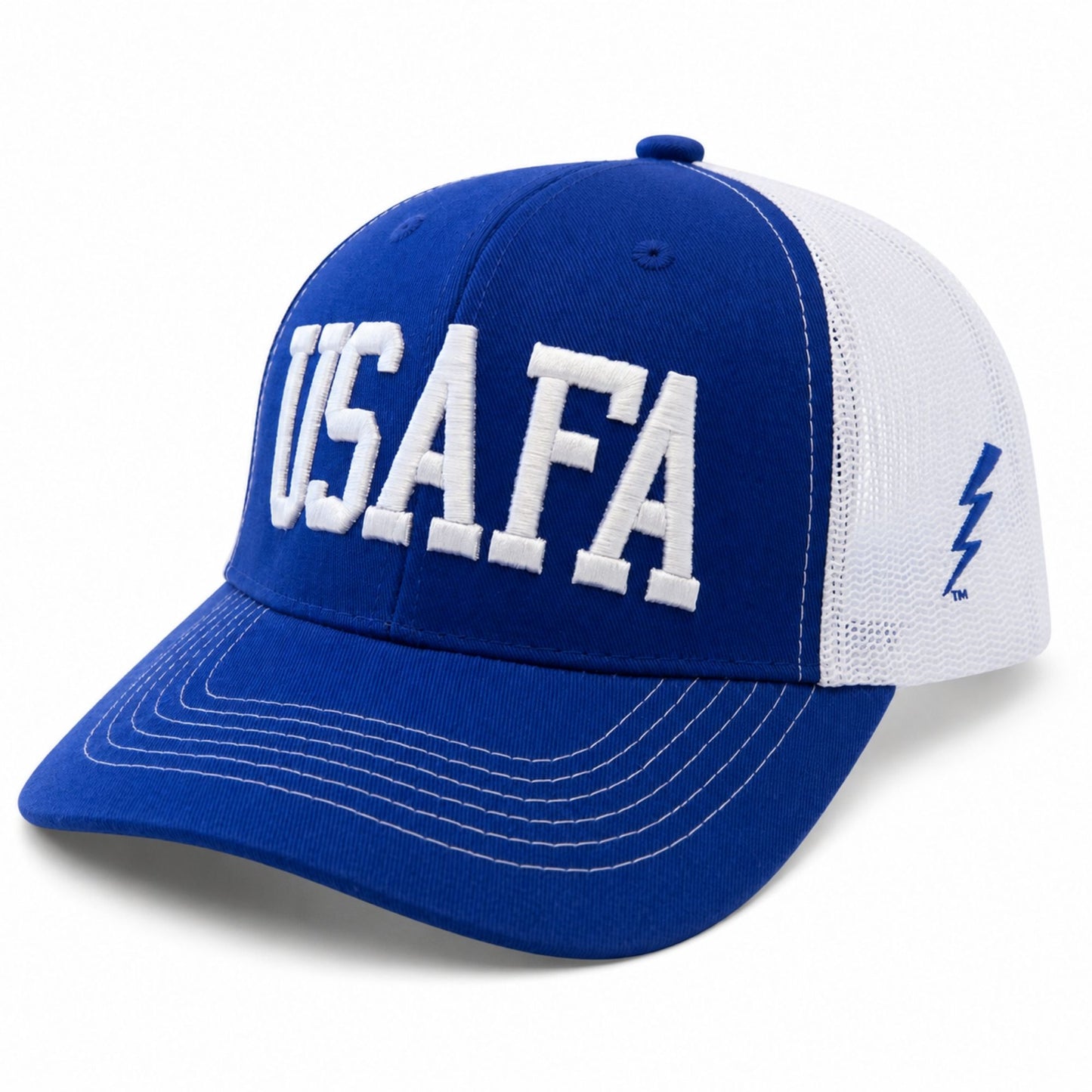 Royal blue and white USAFA Bolt Trucker Hat with raised embroidered USAFA lettering, side bolt logo, mesh back panels, and adjustable snapback closure.