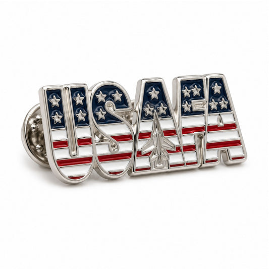 Silver USAFA enamel lapel pin featuring an American flag design with red, white, and blue accents.